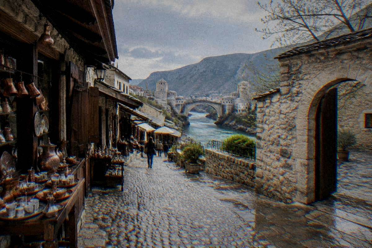 A quiet museum courtyard in Mostar with stone paving and wet flagstones, an arched stone doorway, grey overcast light, Kujundziluk