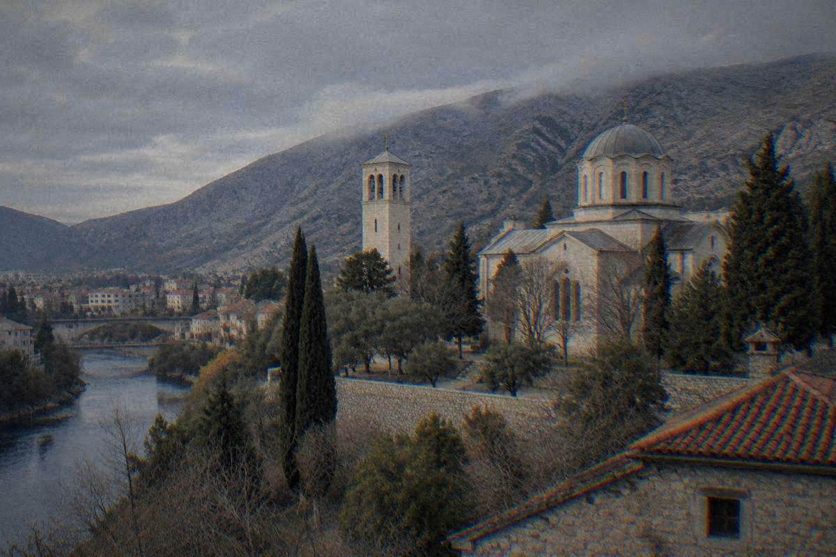 The Orthodox Cathedral of the Holy Trinity in Mostar, a pale stone church with a dome above a quiet terrace of trees, Saborna crkva Svete Trojice