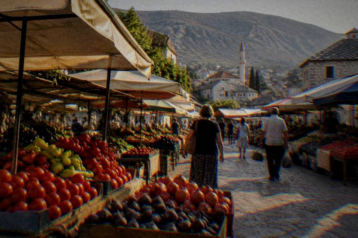 Tepa market in Mostar, fruit and vegetable stalls under awnings in midday light, shoppers seen from behind, Tepa tržnica