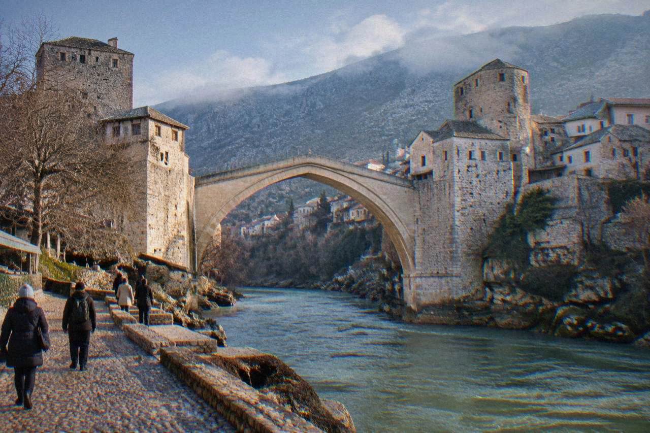 The Old Bridge in Mostar under a winter sky above the Neretva river