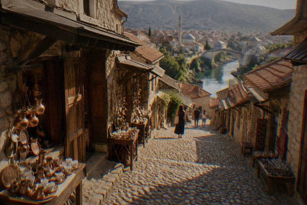 Red-tiled roofs of the Old Bazaar quarter rising above the Neretva in Mostar