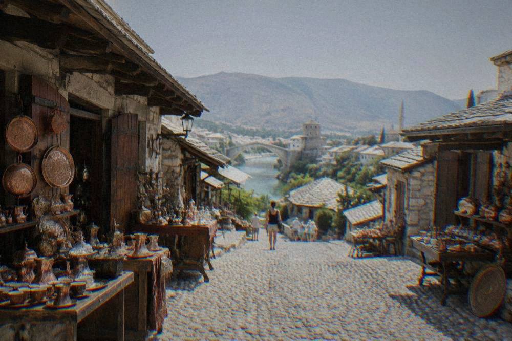 Cobbled bazaar street with stone shops and copper goods in Mostar's Old Town