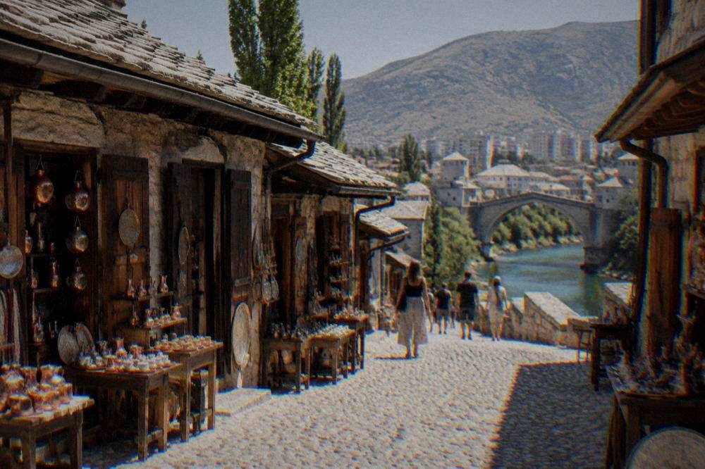 Apartment buildings along the Bulevar in west Mostar under a clear sky