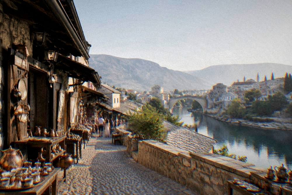 Evening light on the Neretva river with west Mostar buildings on the far bank
