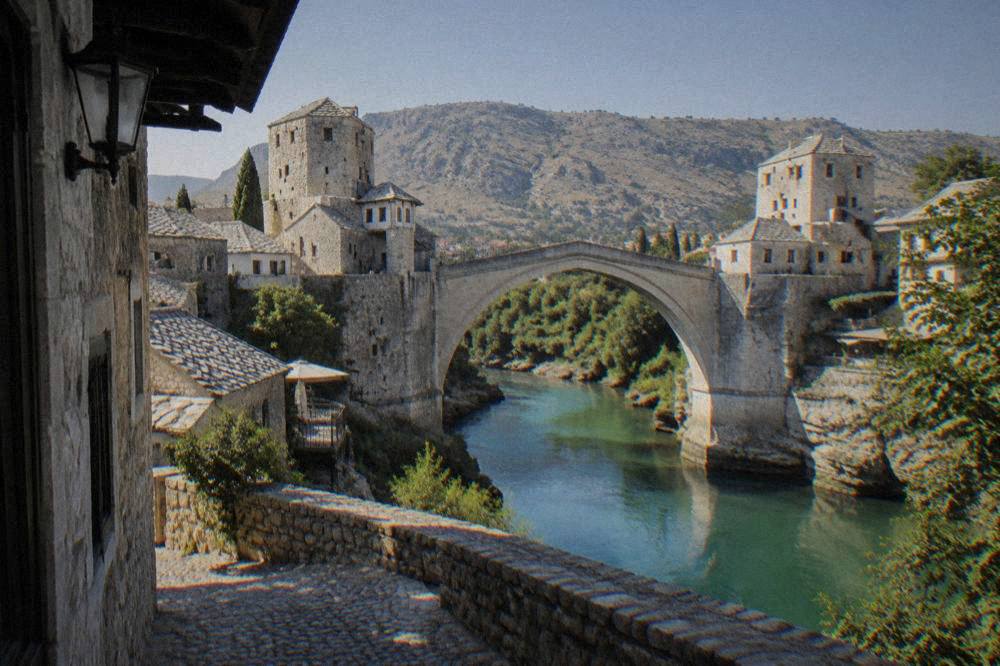 Old Bridge at dawn seen from a quiet street on the west bank of the Neretva