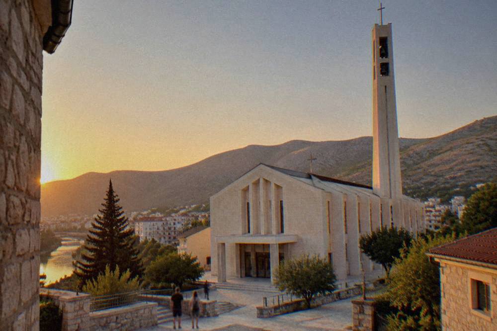 The modern facade and entrance of the Franciscan Church of Saints Peter and Paul in Mostar