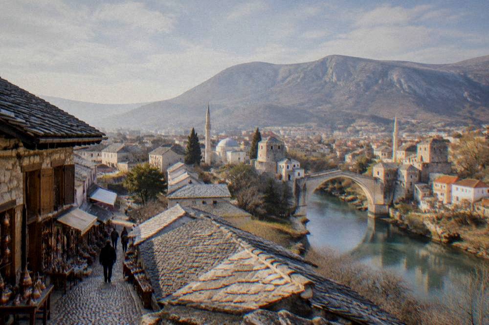 Morning light over the rooftops and hills of Mostar seen from a high vantage point