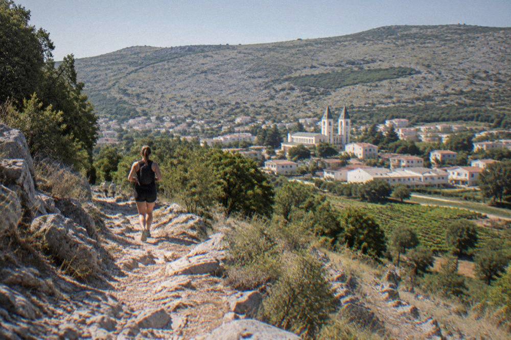 A rocky path winding up Apparition Hill above Međugorje