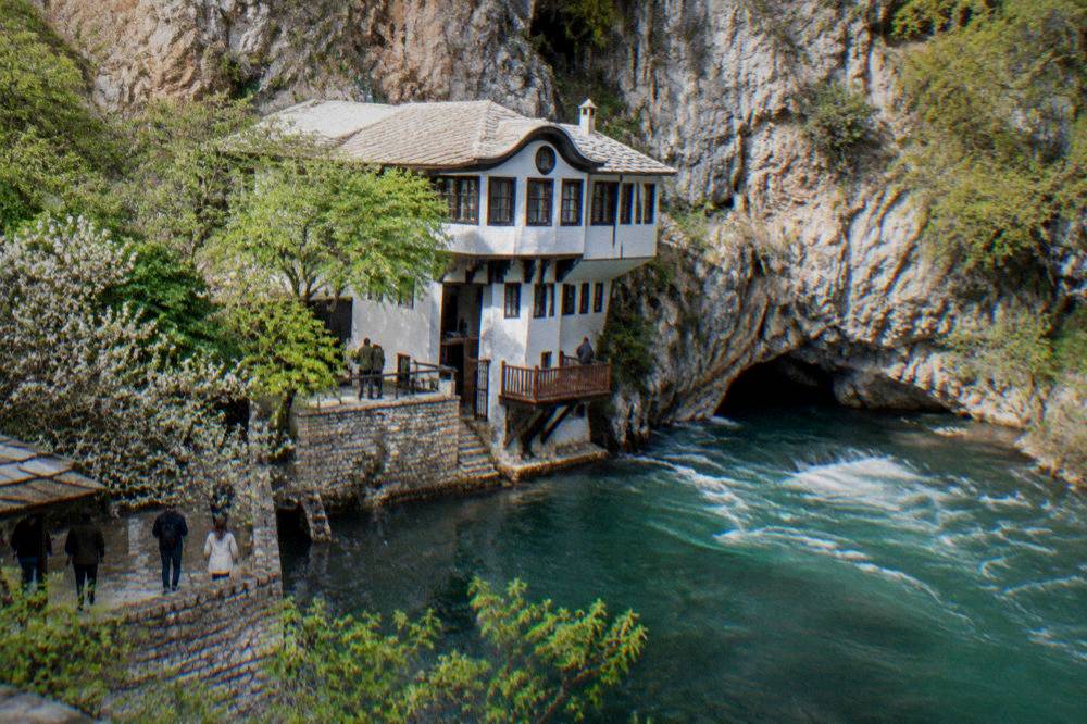 The white walls of the Blagaj Tekke at the Buna spring on the route south of Mostar