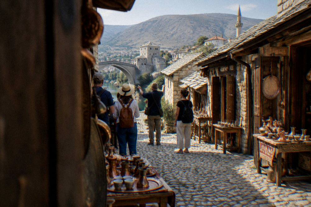 A guide showing a small group of visitors a historic stone street in an old town