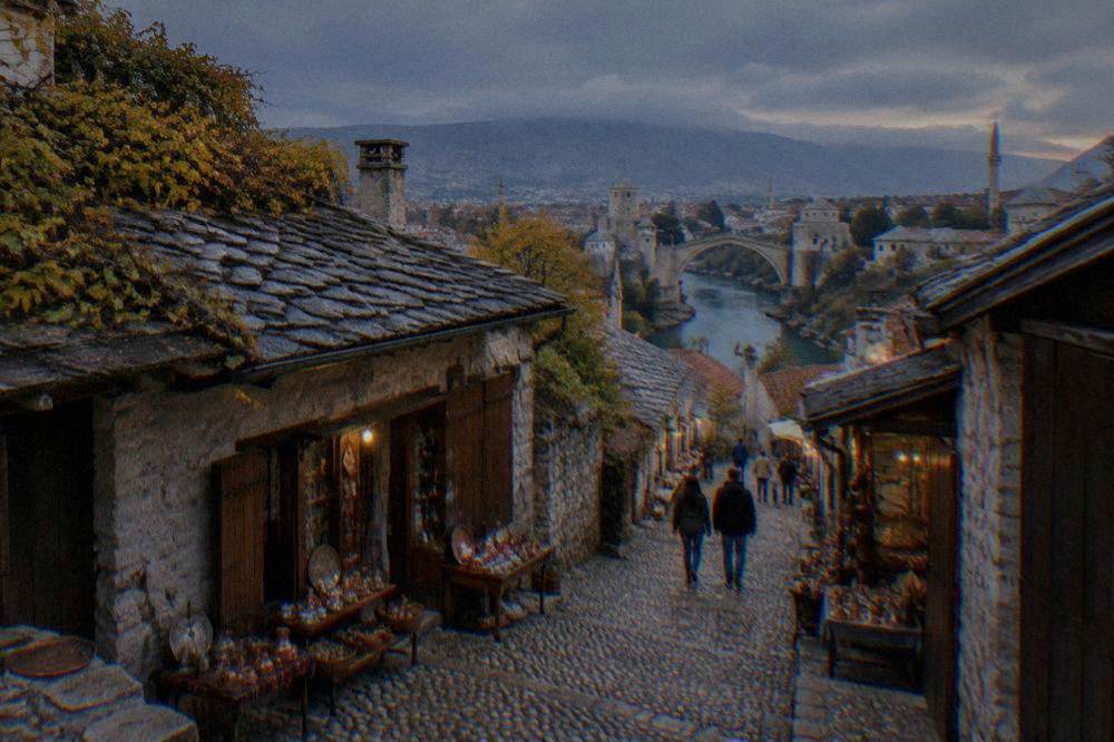 Rain clouds over the Neretva river and the rooftops of Mostar in late autumn