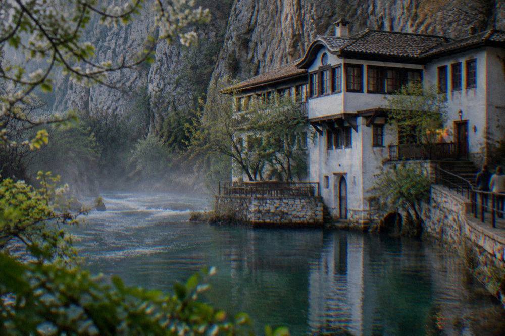 Mist rising over the Buna river spring at Blagaj near Mostar in the morning