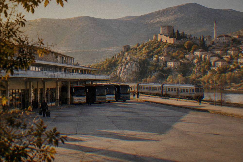 A fortified stone village on a hillside above a river in Herzegovina
