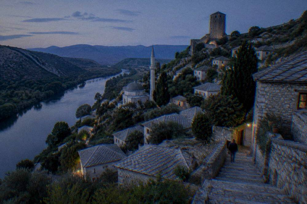 Fortified stone houses of Počitelj village climbing a hillside above the Neretva valley