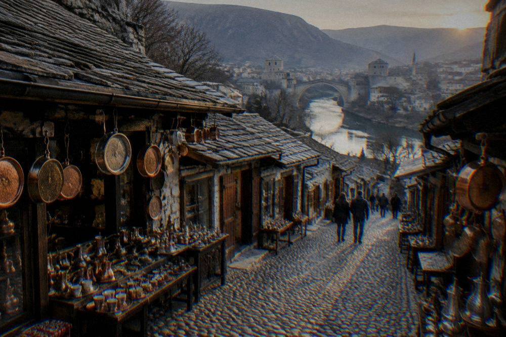 Coppersmith shopfronts and hanging pans along the stone bazaar street at dusk