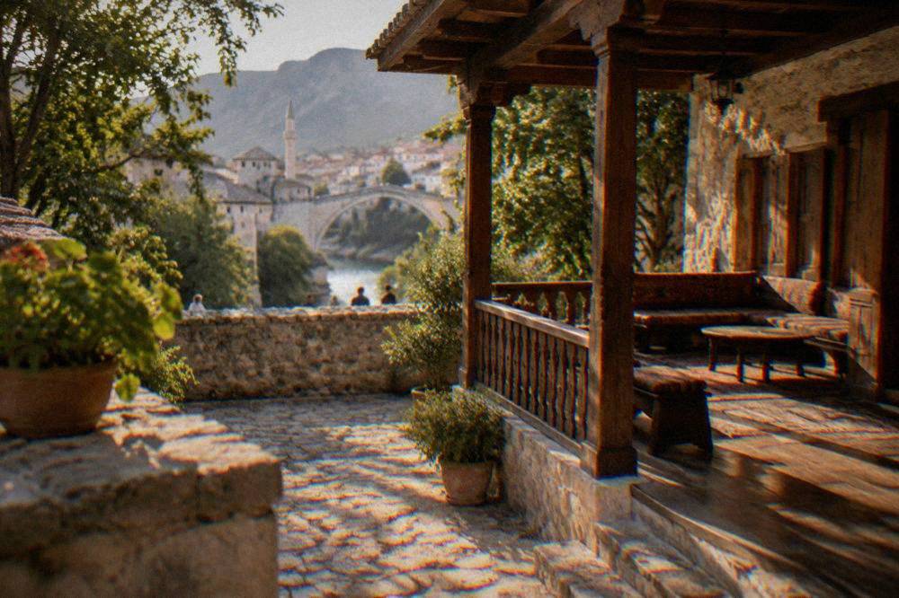 Courtyard of an Ottoman stone house with wooden veranda in Mostar