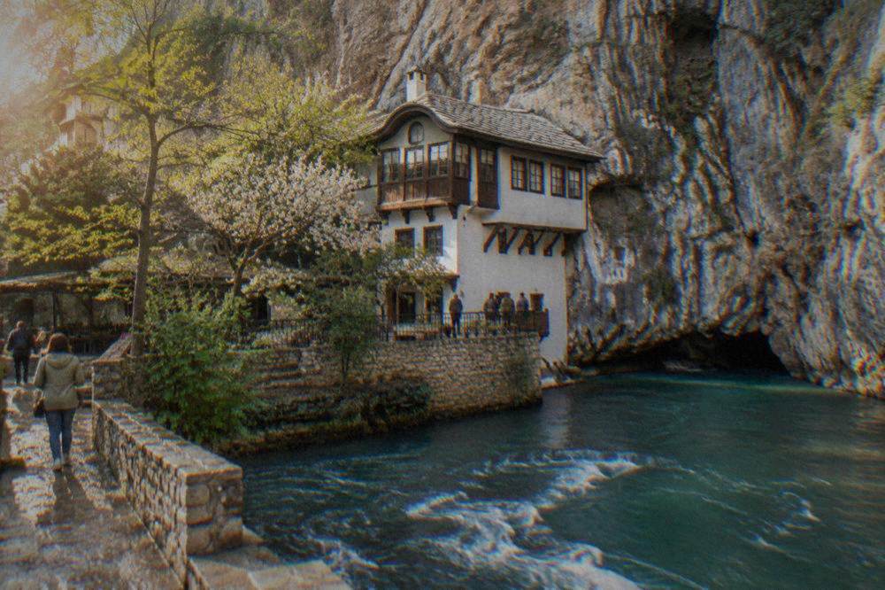 Dervish lodge built against a cliff above the blue Buna spring at Blagaj
