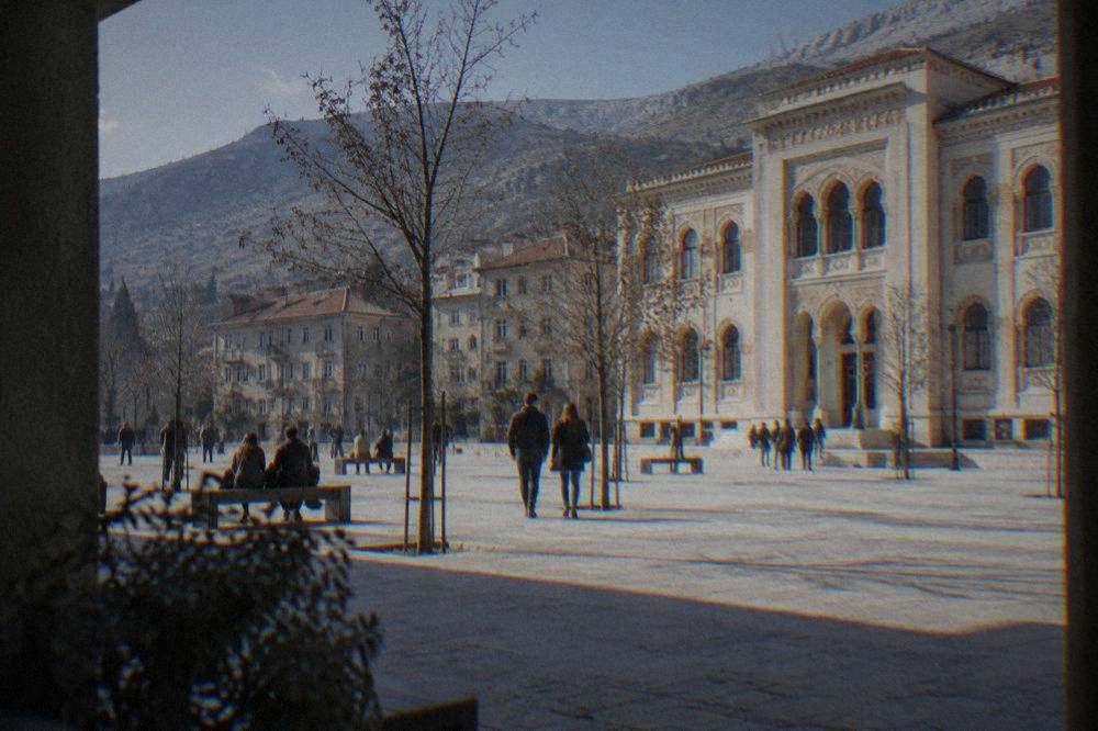 Visitors gathered at Spanish Square in Mostar on a sunny morning