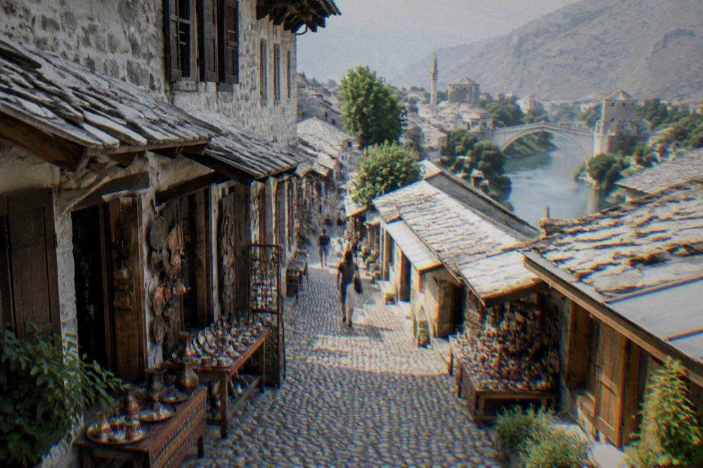 A quiet cobbled lane in Mostar's old town in early morning light